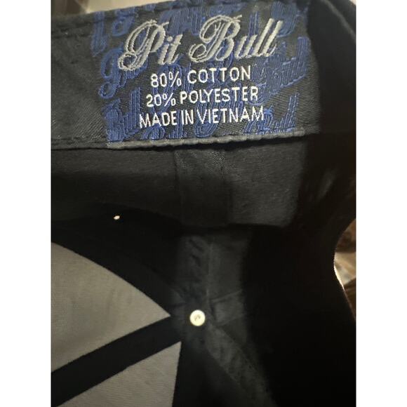 This is a Pit Bull Pukka black snapback hat with a glitter brim. Wore once - Picture 5 of 6
